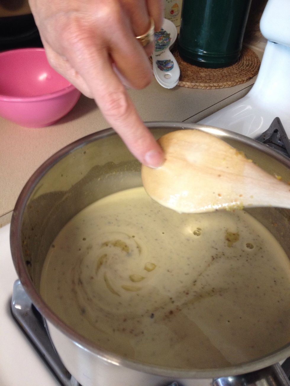 Once you can draw your finger along the back of a wooden spoon and a trail is left behind then the mixture is thick enough