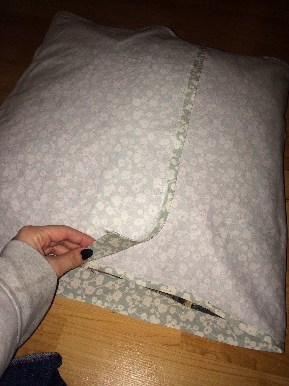 Once you can see the flap length, tape and fold over the other flaps of the fabric.