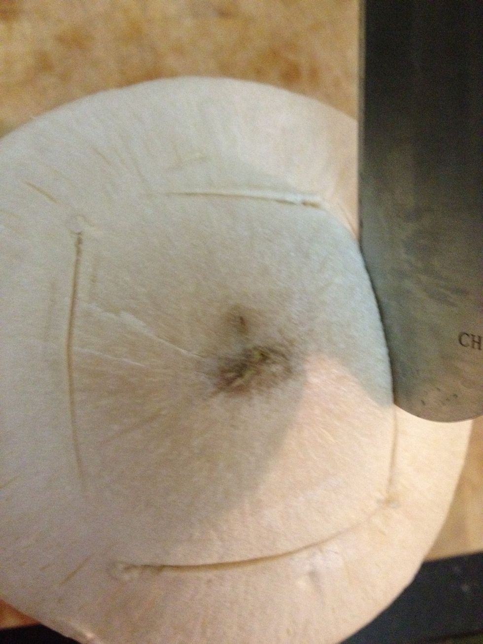 Once you chop into the 4 edges, use the sharpe inside point of your knife to dig into one side where the corners meet and lift up - see next pic for example www.PowerofFood.com