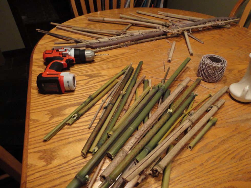 Once you decide the width of your chimes, cut the top branch to size and drill holes 1-2 inches apart down the whole piece. Your hanging bamboo pieces will also need holes about 1/2 from the top.