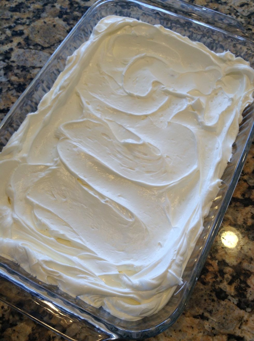 Once you dollop and spread, place in fridge and let it remain there until you are ready for strawberry topping. Please note: you may have some filling left over FYI it's great as a fruit dip