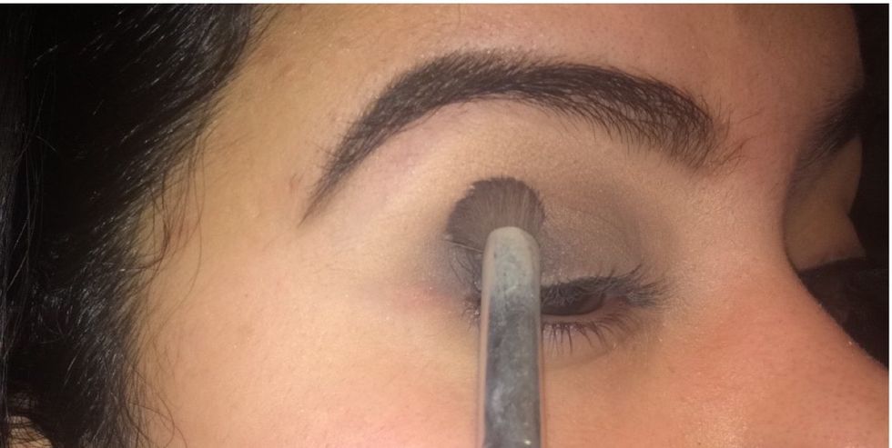 Once you feel the back is dark enough for you,with no new product, get your dence brush from step 5, very lightly and in circular motions blend the black with the grey, but stay in this outer area.