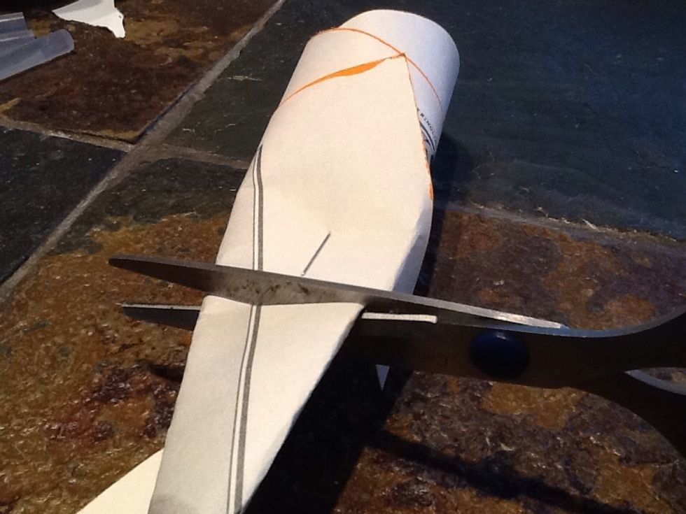 Once you get multiple layers down, you will need to start trimming the tails off your petals before you glue them, as it gets crowded quickly.