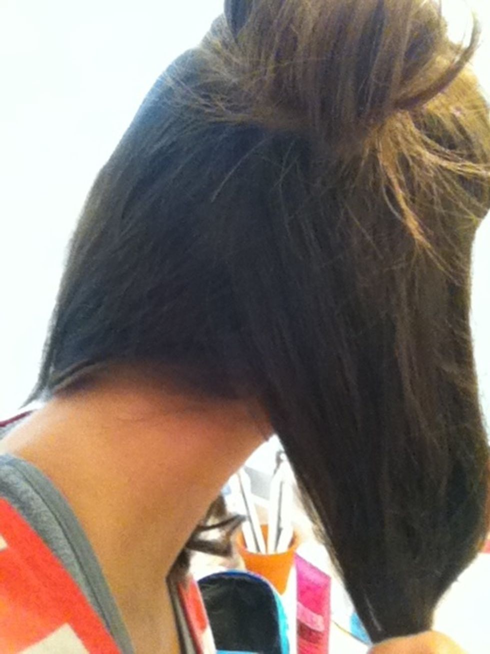 Once you get to the back of you hair just split your hair in half