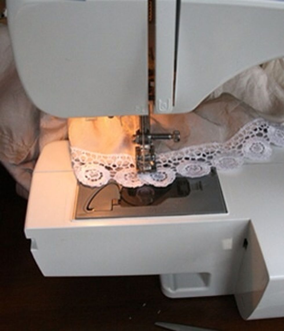 Once you get to the ends, fold the lace under and sew downwards.