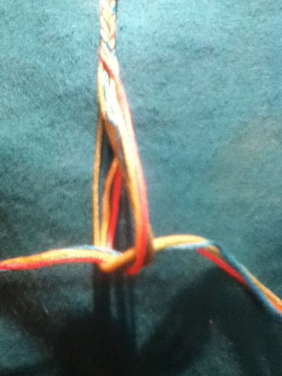 Once you get to the length you want take the both sides at the end and tie it in to a knot
