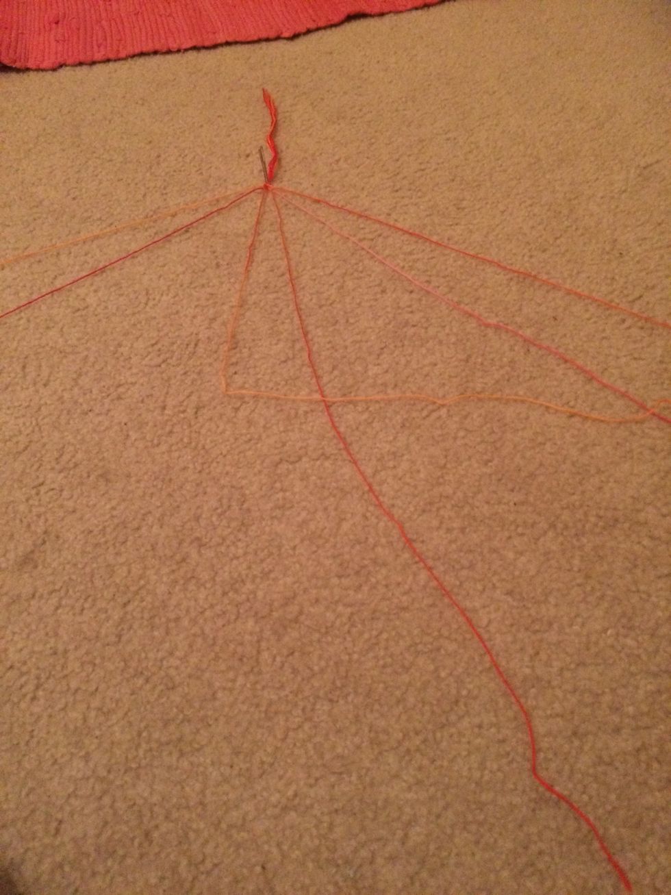 Once you get to the middle with both. Cross the left most strand and do the knots again with the strand to the right