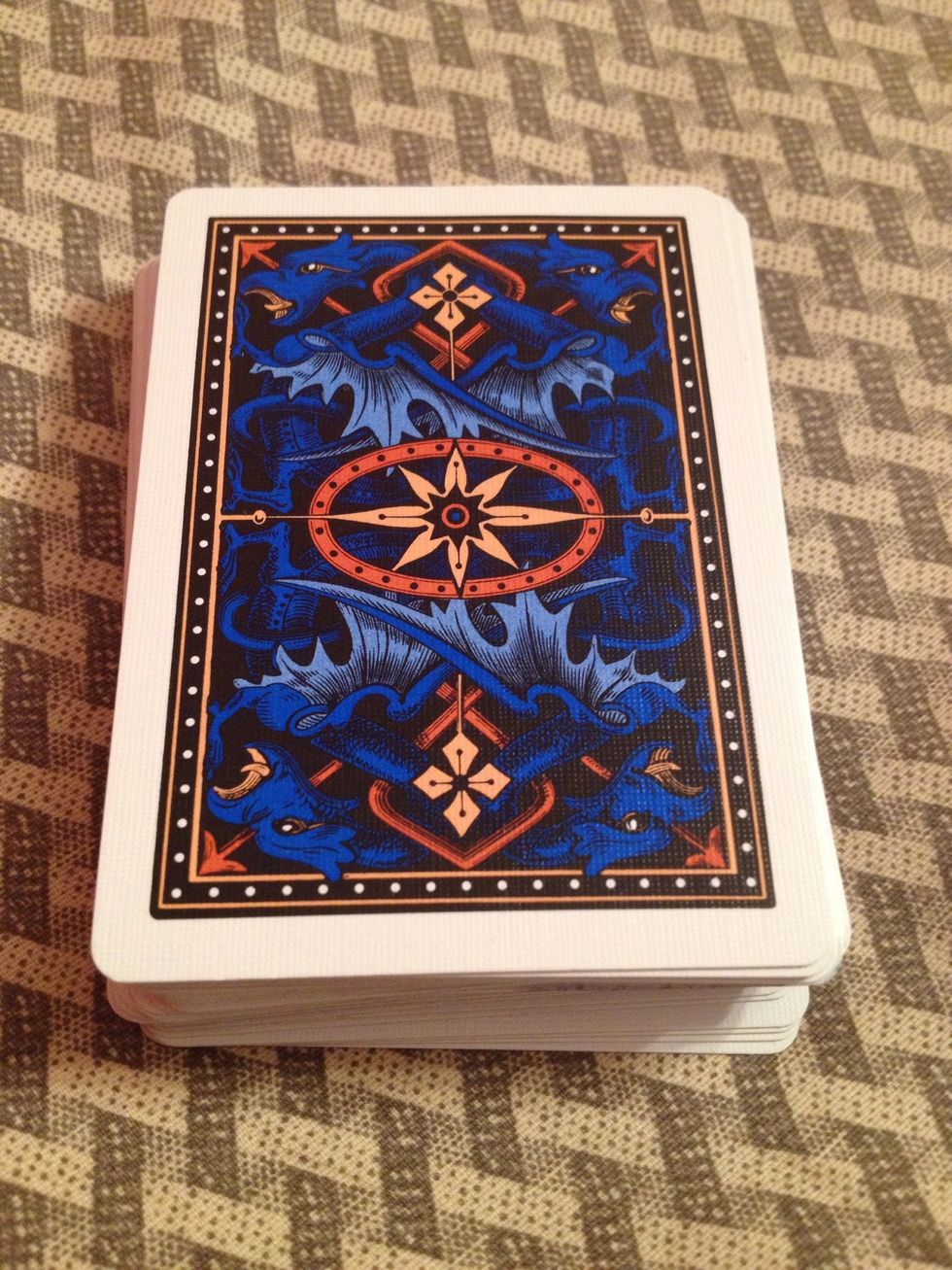 Once you get to your pinky put the rest of the cards on top.