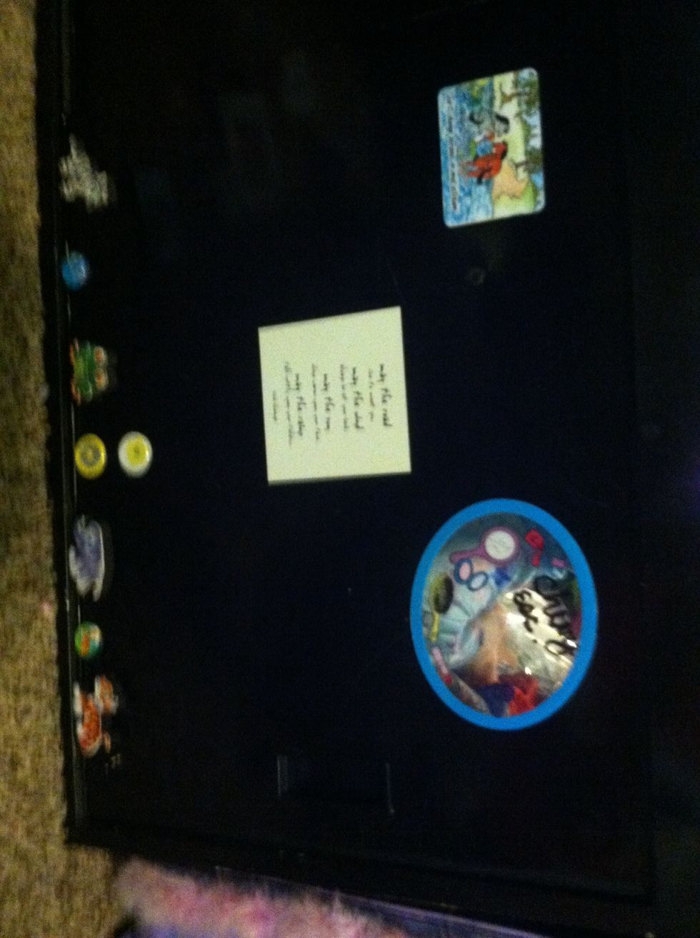 Once you have all your magnets you want, start placing them on your cabinet.
