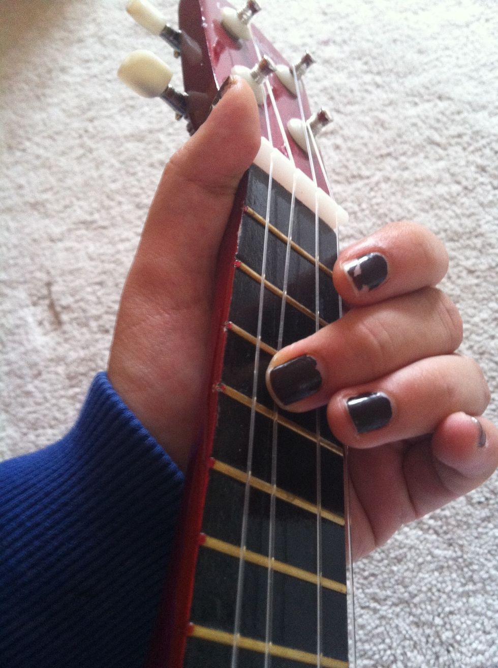 Once you have C(4) properly tuned, hold down the 4th fret of the C string and again, keep plucking the 3rd string while changing the tuning until it sounds the same as the C string with 4th fret held