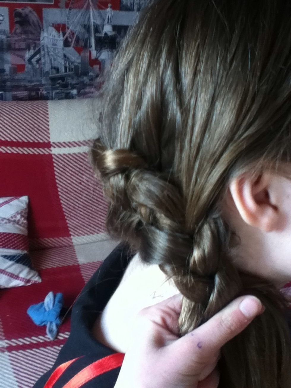 Once you have done the tricky combining bit, you do a regular braid. This time, put the pieces OVER each other! If you continue reverse braiding, it ends up really loose and messy.