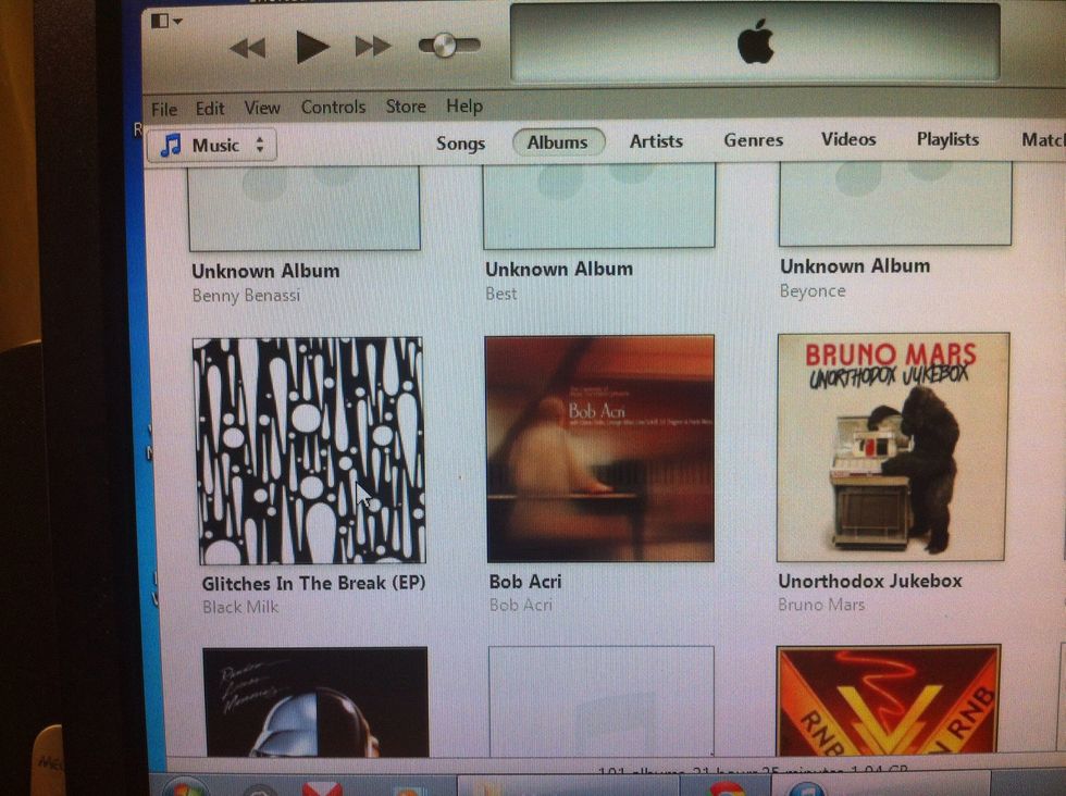 Once you have dragged it to your albums you should find it...(all albums don't come with cover art) so loom at enscription..in this case "black milk".