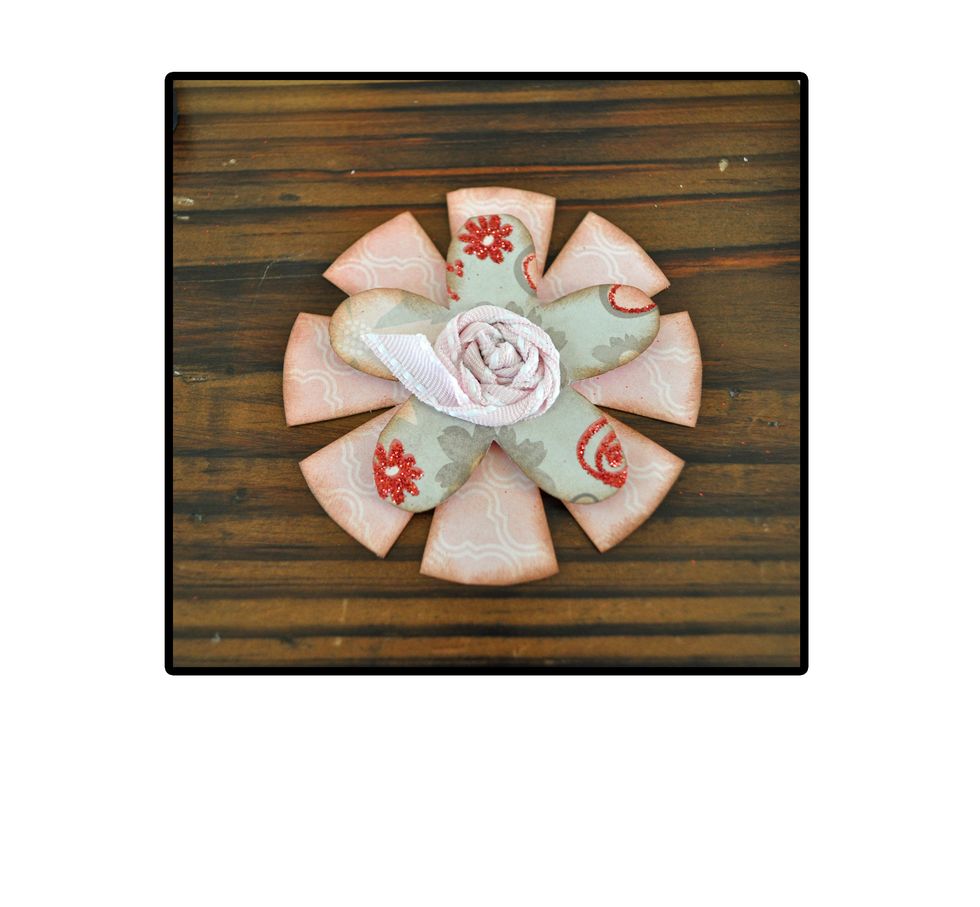 Once you have filled the space you want, snip the ribbon and tuck under the edges of your center. I went ahead and added a bit more glue to make sure the end stayed put.