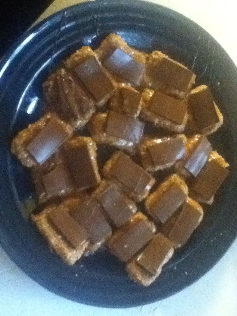 Once you have finished, place the bars in the microwave for 30-45 seconds. You could probably place in the oven at a low temperature as well. Just enough to melt the chocolate.