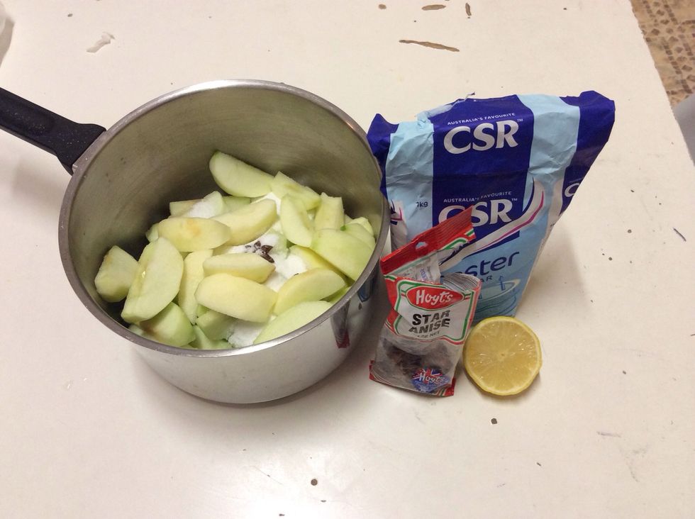 Once you have peeled and cut the apples, put them into a medium saucepan with the juice of half a lemon, 1 cup of caster sugar and 1 star anise.