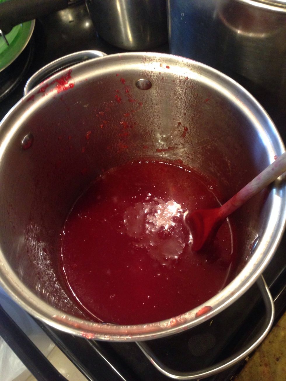 Once you have squished all the berries u should have 2 cups of pulpy juice. Add the honey pectin mixture stirring vigorously for 1-2 minutes to dissolve the pectin.