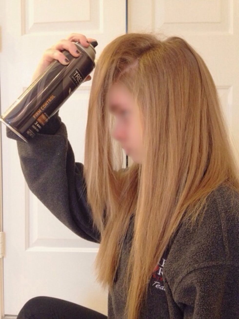 Once you have teased your hair, spray the hair with hairspray to make the teasing stay.