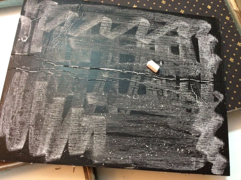 Once you have the desired coverage, & it's totally dry, you will need to "cure" the surface. Using the side of a piece of chalk, rub over the entire surface. Wipe with a dry cloth. Do this 2-3 times.