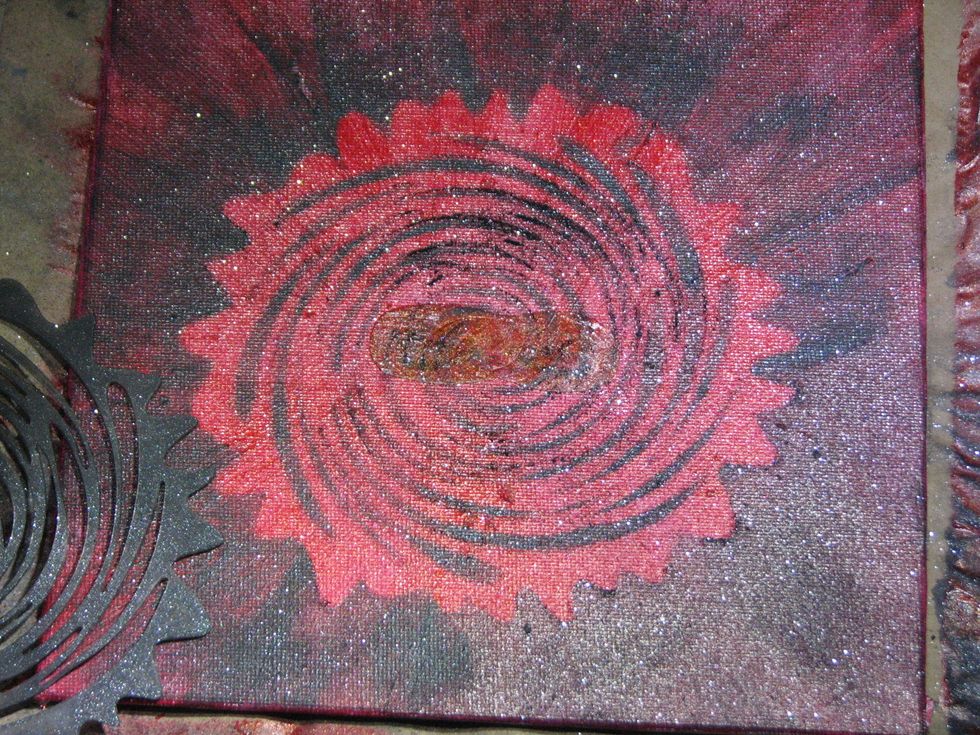 Once you have the entire canvas/stencil covered carefully remove the stencil and mask from the canvas.