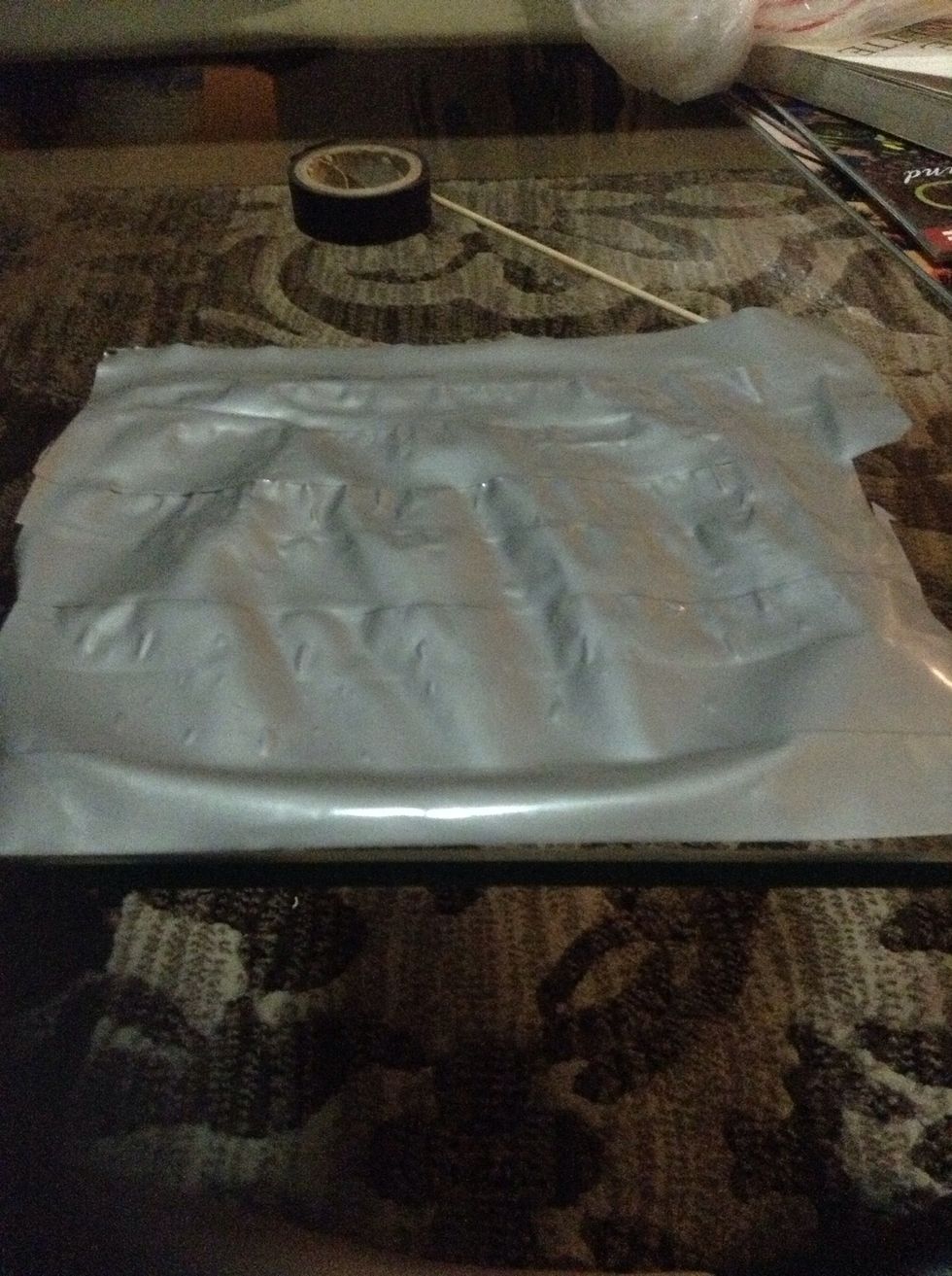 once you have used all the strips it should look like this and you need to make the edges fold over so its not sticky