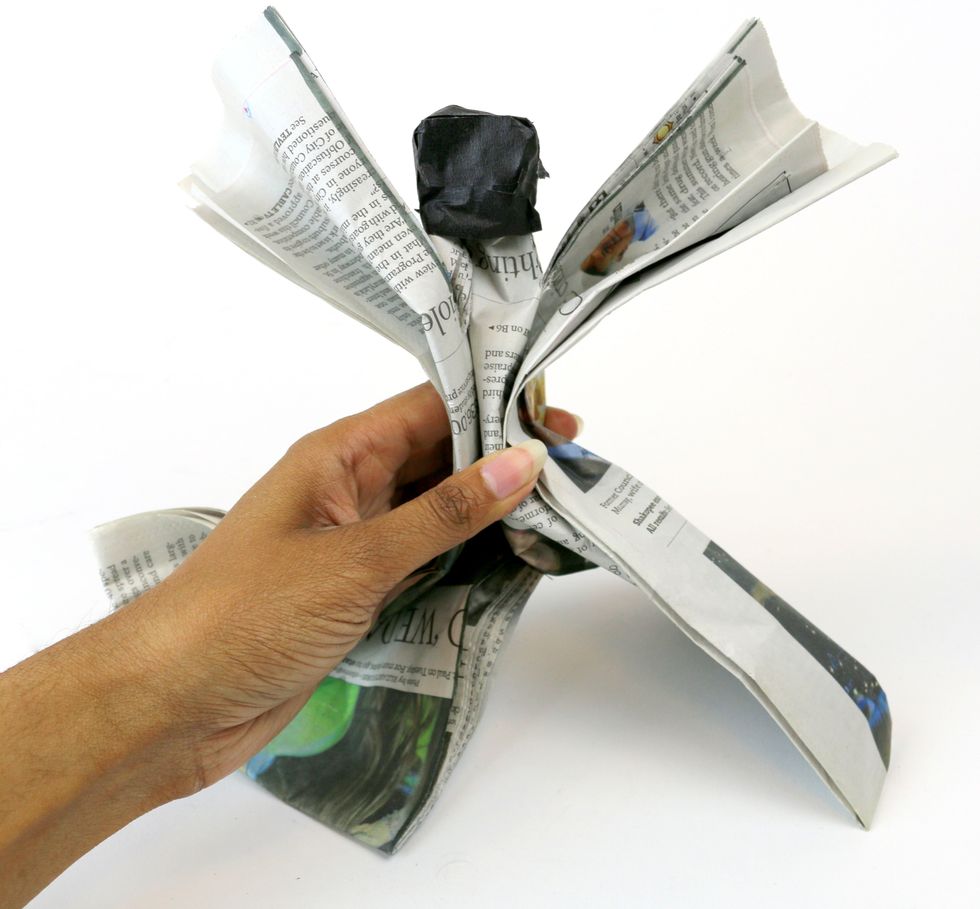 Once you have wrapped enough tape to cover the head, fold the other flaps out as shown above.