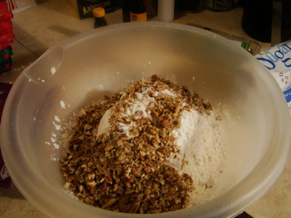 Once you measured the flour ,salt and diced almond add them to the other ingredients in side the big bowl.