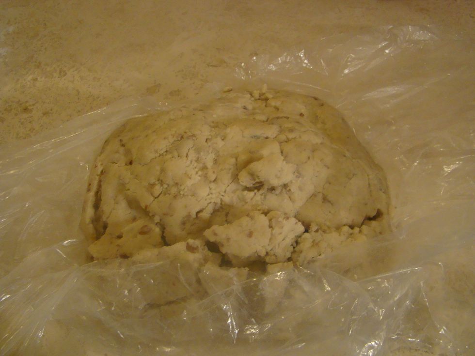 Once you mixed the ingredients roll it into a ball on plastic wrap. Make sure there is flour on the plastic wrap.Then wrap them up in plastic then put the dough in the freezer for 30 min.