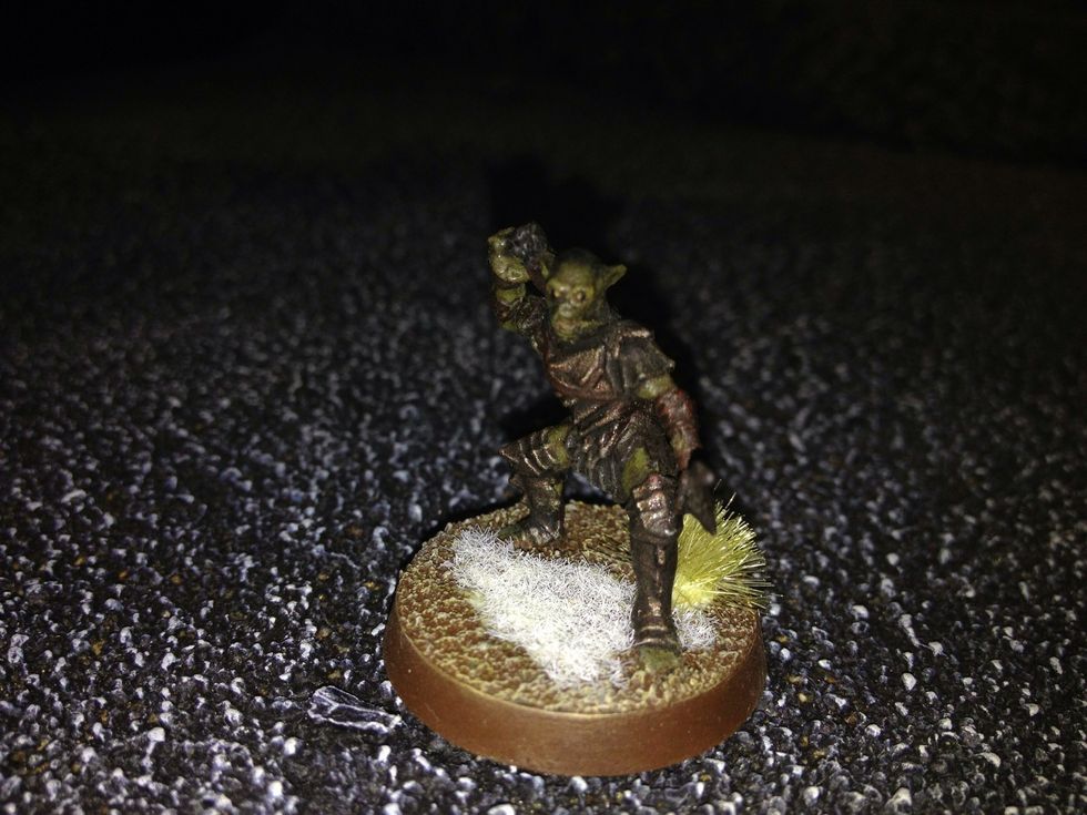 Once you're satisfied, congratulations! Your miniature is finished. Remember, this is just a basic guide. There are lots of ways to make a base unique, setting one model apart from the rest.