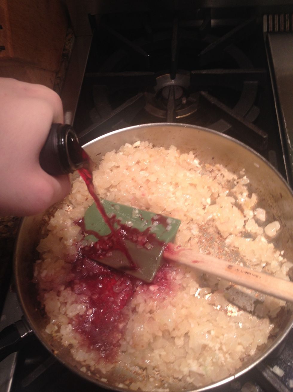Once you smell the garlic you crank the heat all the way up and pour your wine in. Try and scrape all the stuff off of the bottom (its called deglazing) *you can also use white wine