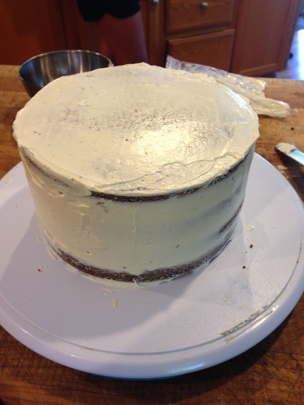 Once you stacked all the layers, give it a crumb coat, and pop it in the fridge for at least 10 minutes!