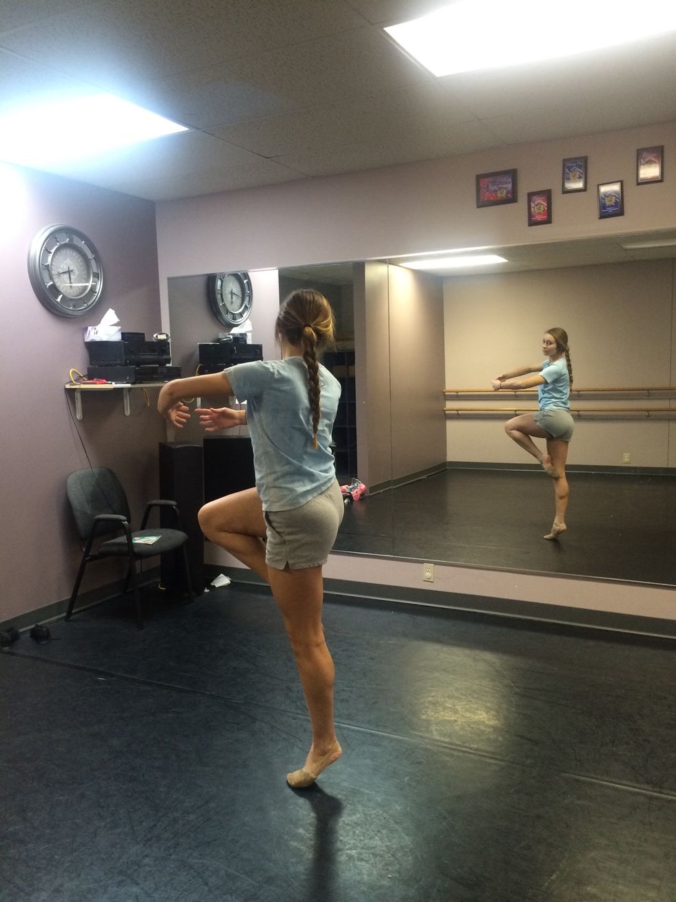 Once you turn more than 180 degrees, flip your head to find the same place in front of you. This is called a "spot." This keeps you from getting dizzy and ensures a successful pirouette.