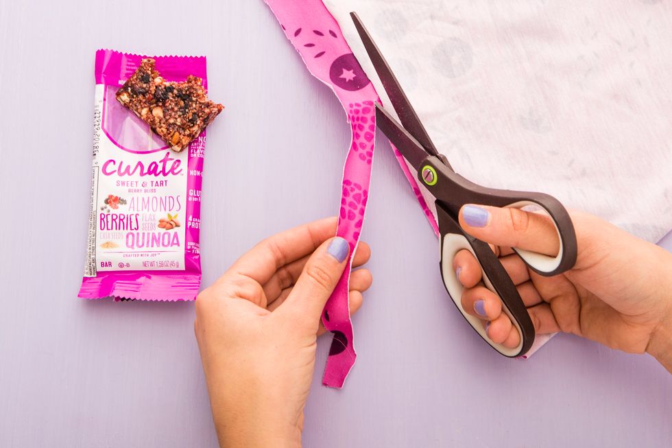 Once you\u2019re done sewing, trim excess fabric.