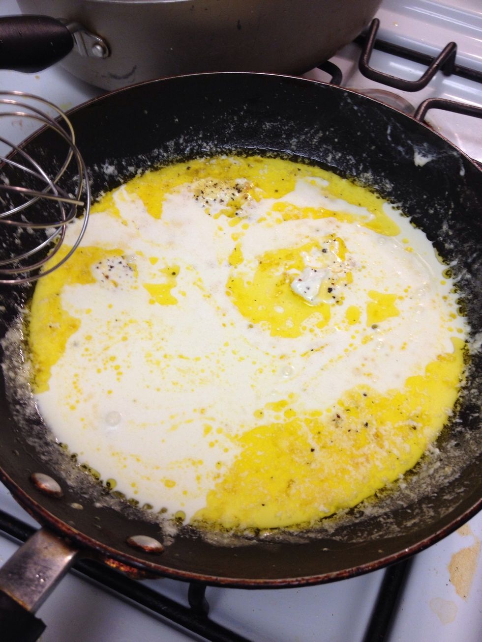 Once you've added the cream. Let it start to boil, and start to whisk.