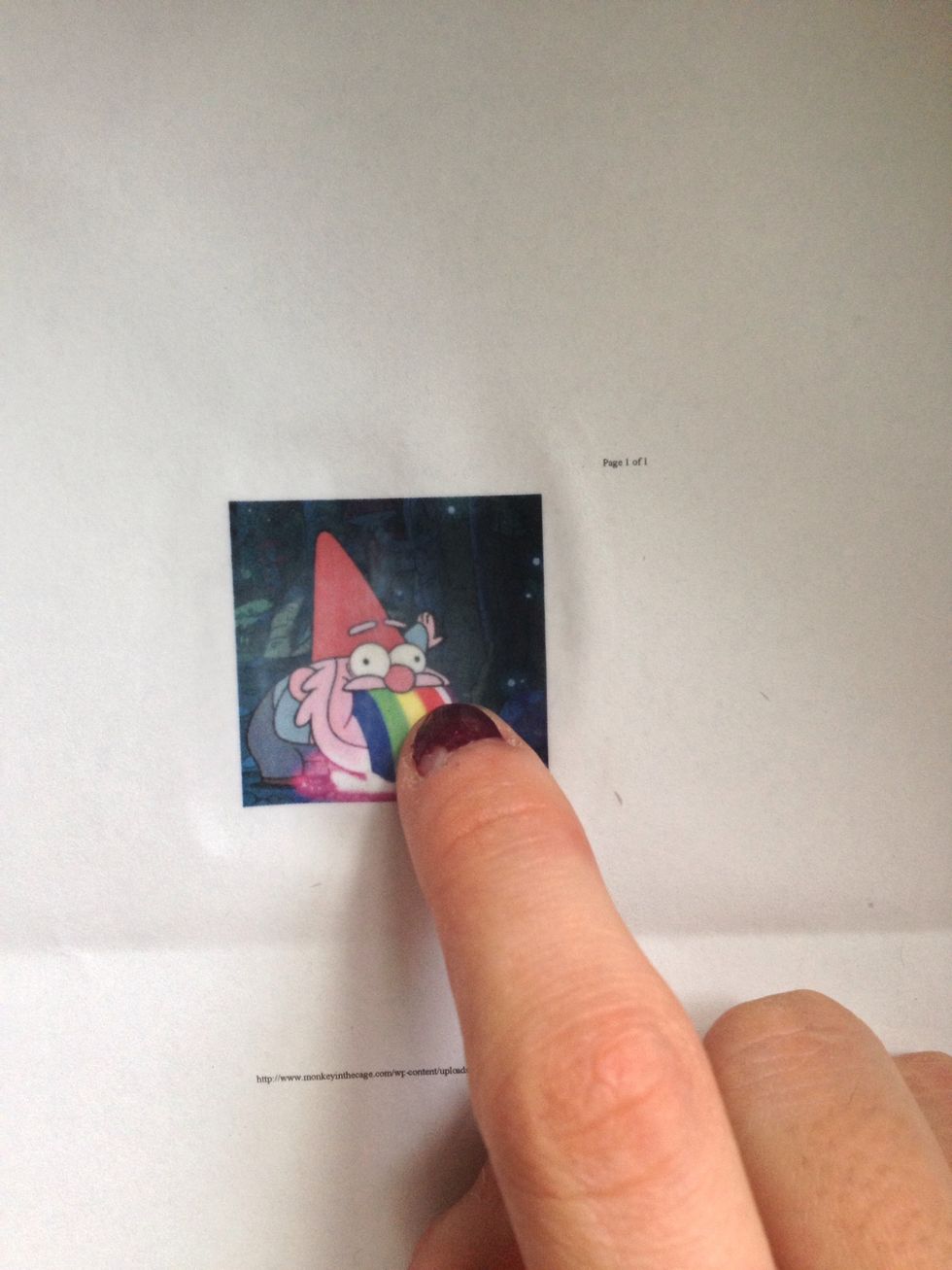 Once you've applied a couple layers of the Mod Podge, let it dry. Check when it's ready by pressing your finger softly to the photo.