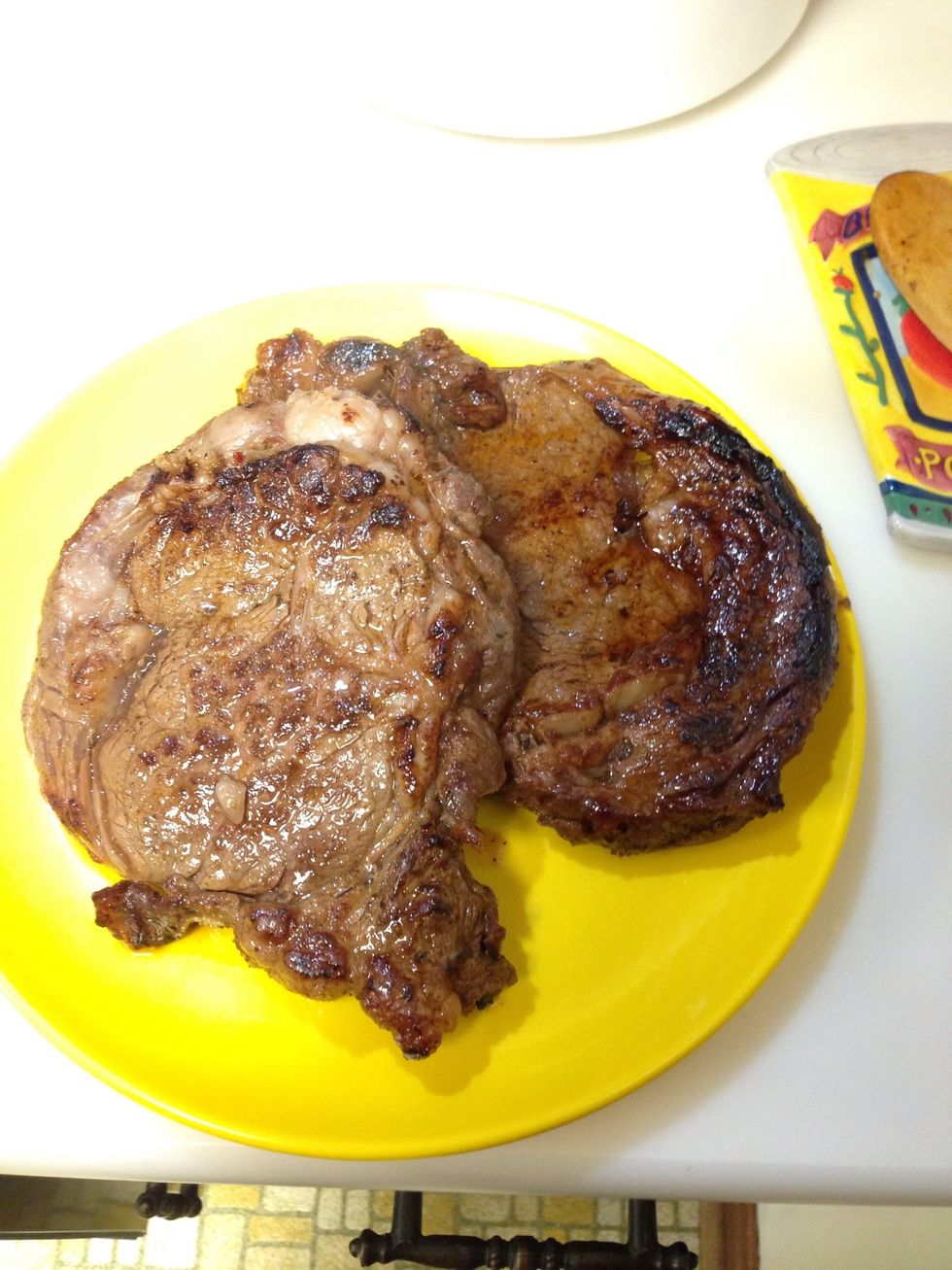 Once you've cooked your ribeye to your liking, take them out and let them rest for 3-5 min. Let the juices settle back into the delectable muscle.