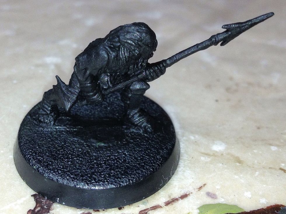 Once you've finished priming the model, leave it to dry. This should take at least 5 hours before you begin painting, and it's best to leave it overnight.