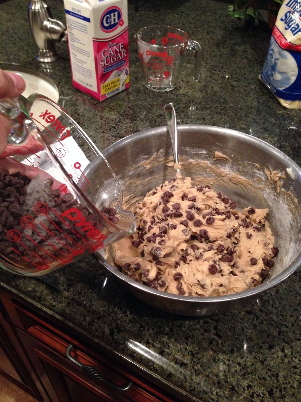Once you've mixed that in and you can't see any flour, add in your chocolate chips.