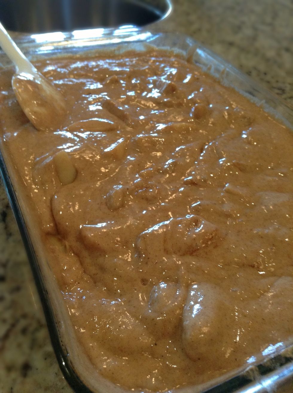 Once you've mixed up the cake mix pour it over your apples and give it a little stir not too much just enough to have apples throughout the cake.