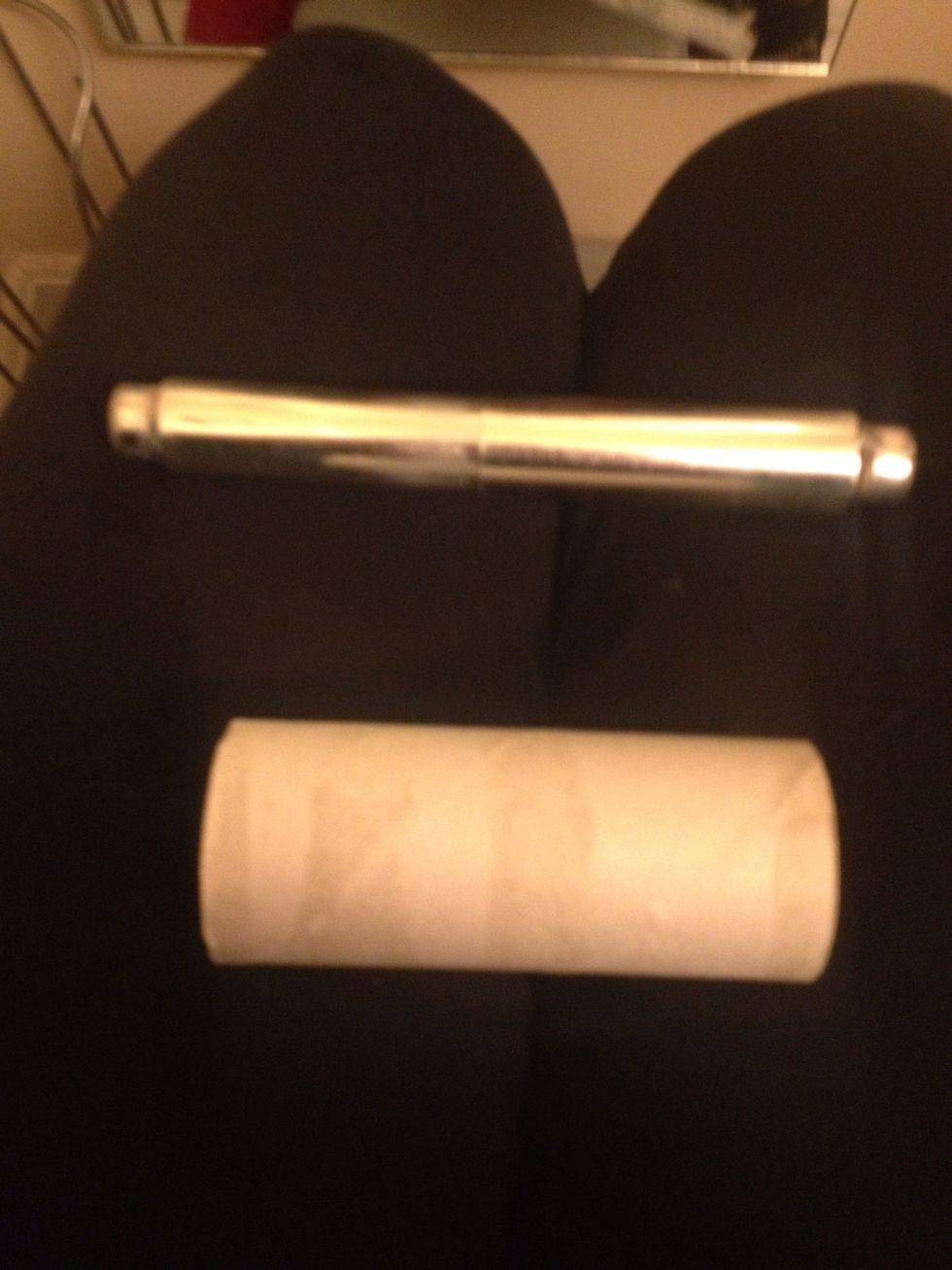 Once you've removed the bar, remove the old roll and discard it, be in the trash or Recycling, the floor is not a good idea!