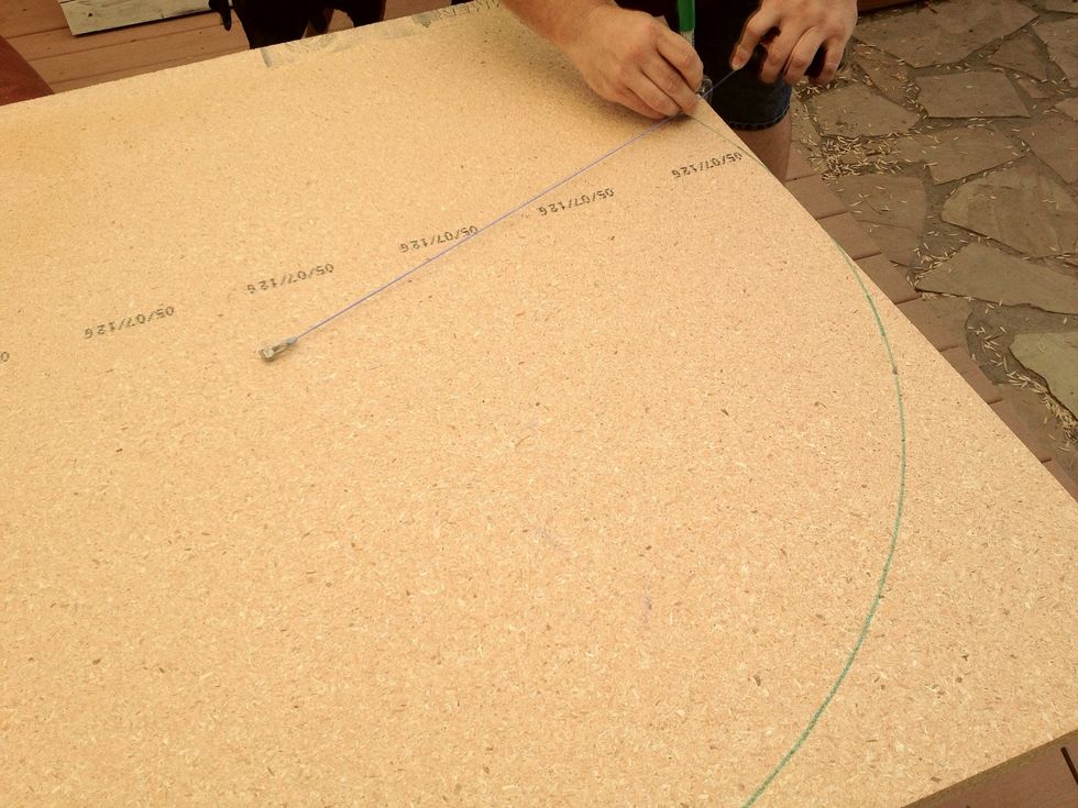 Once you've removed the desired width, mark your arc using a nail and string. Pound the nail in at center 20" from the edge (if you're using this guides dimensions) then let the string guide your arc.