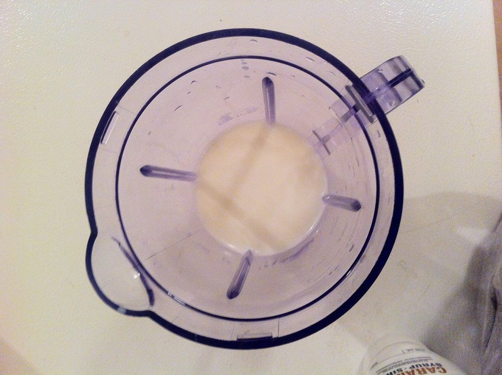 Once you've taken the milk out the microwave, put it into your blender. Don't blend just yet - you need to put the rest of the stuff in first!