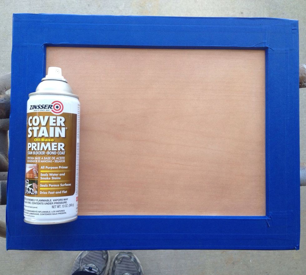 Once you've taped the inside edge of the frame, tape around the outside so that no portion of the frame (except the back) is exposed. Smooth it down completely. Now you're ready to paint!