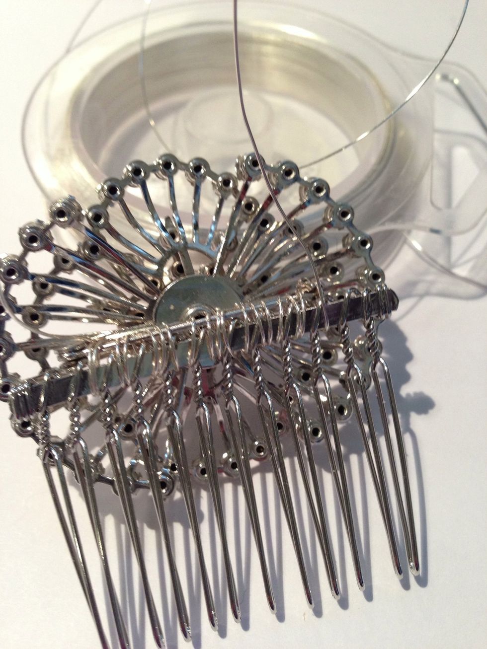 Once you've wrapped wire as far as it will go, and it feels snug, finish by doubling  the wire back through and knotting both ends. Clip off the excess wire and tuck the pointed ends in.