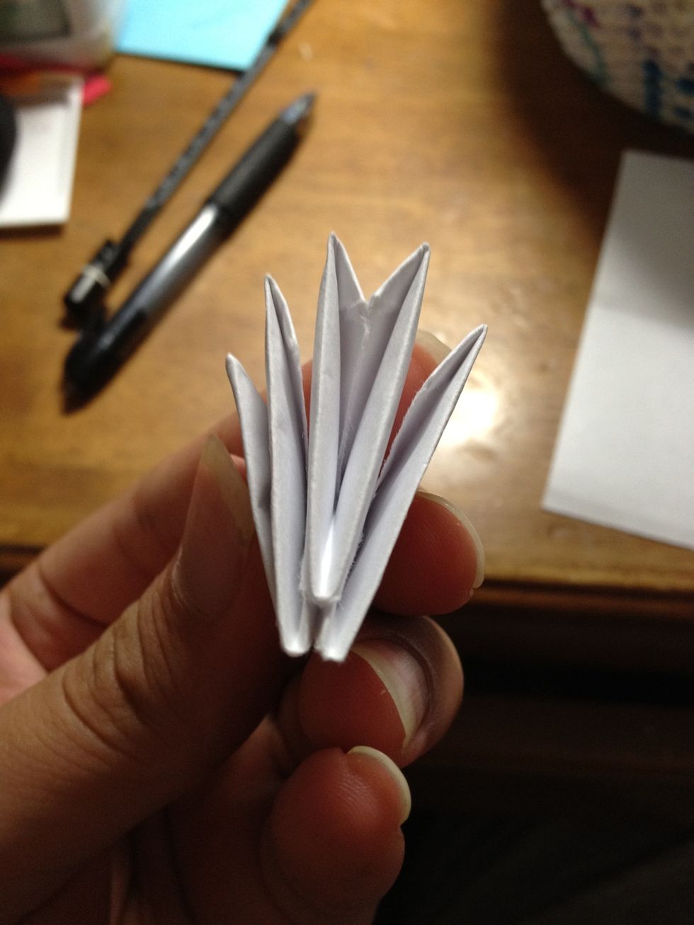 Once your base is complete, you may begin putting more pieces on. Each row will alternate (looking like a wall made of bricks). Each pocket on the bottom will fit onto two pieces on the previous layer