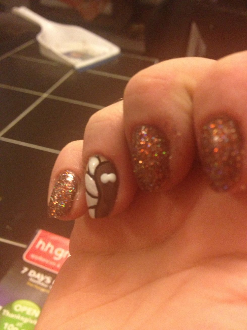 Once your body is dry, take a dotting tool, or toothpick and create two white eyes