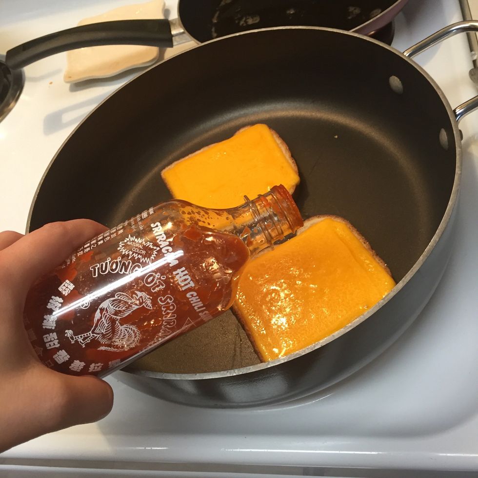 Once your cheese has melted add sriracha