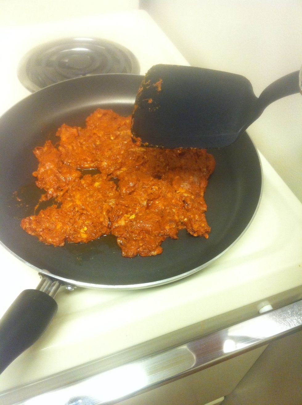 Once your chorizo is getting good and cooked, add some eggs. Sorry, no pic of eggs & chorizo. Be sure to pour eggs over all meat. Don't over scramble. Make it omelet like.