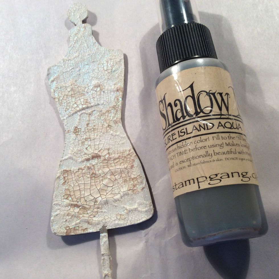 Once your crackle paste is dried I gave a light coat of Treasure Island Turquoise Moon Shadow... Look at the pretty glow it achieves with only one coat.