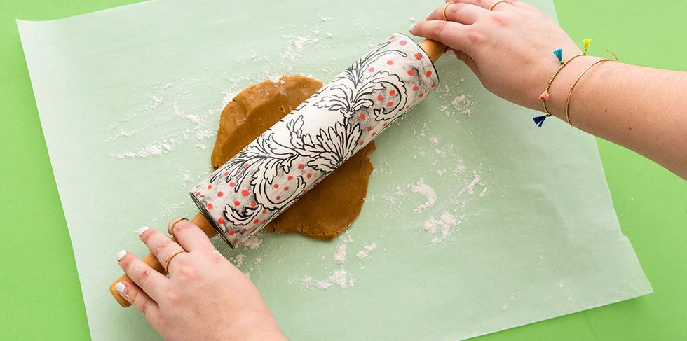 Once your dough has hardened, pull it out of the fridge and preheat your oven to 350 degrees Fahrenheit. Flour a clean surface and roll out the dough evenly to about \u00bc inch.