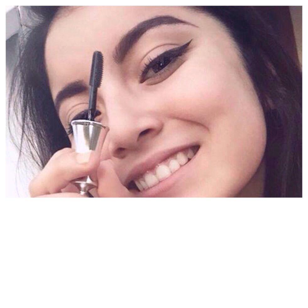 Once your eyebrows are filled in, use the setting gel to brush over your brows to keep the brow hairs in place.